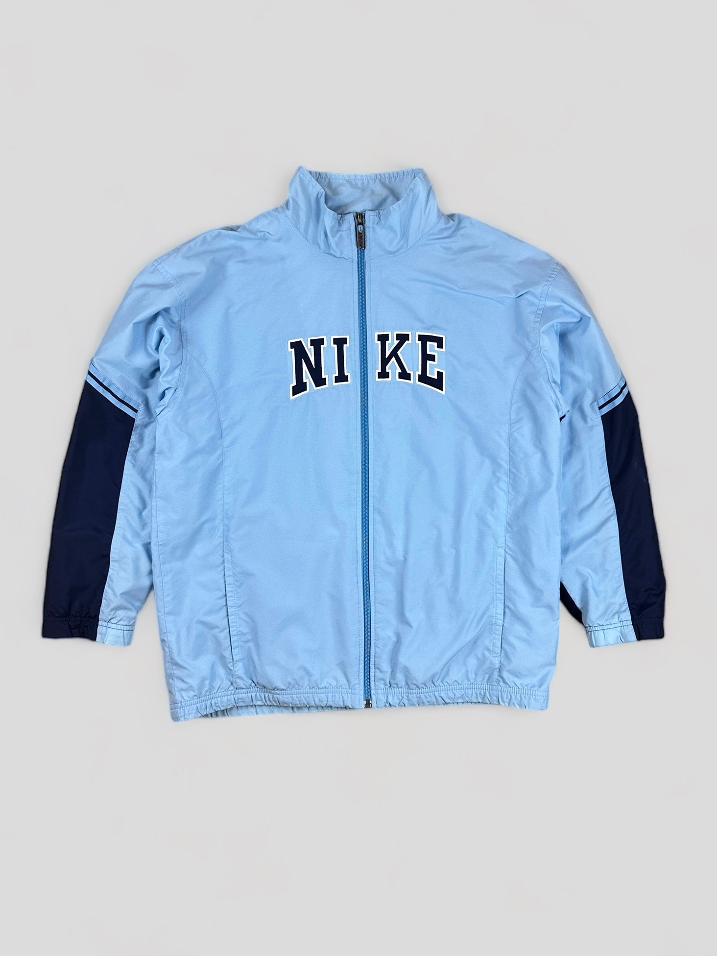 Vintage 00s nike blue track jacket